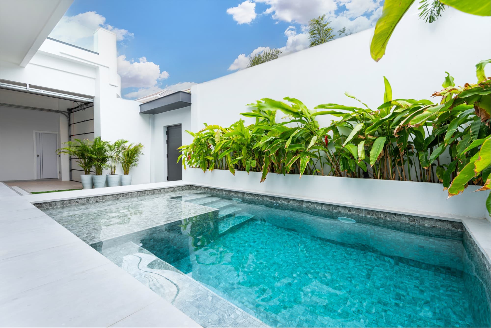 One of two private saltwater pools at the Villa Azure 9-bedroom compound.